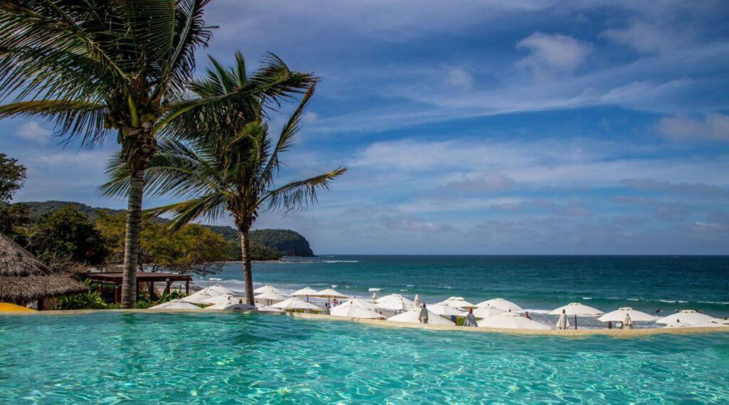 The pool overlooking the beach at Kupuri Beach Club in Punta Mita